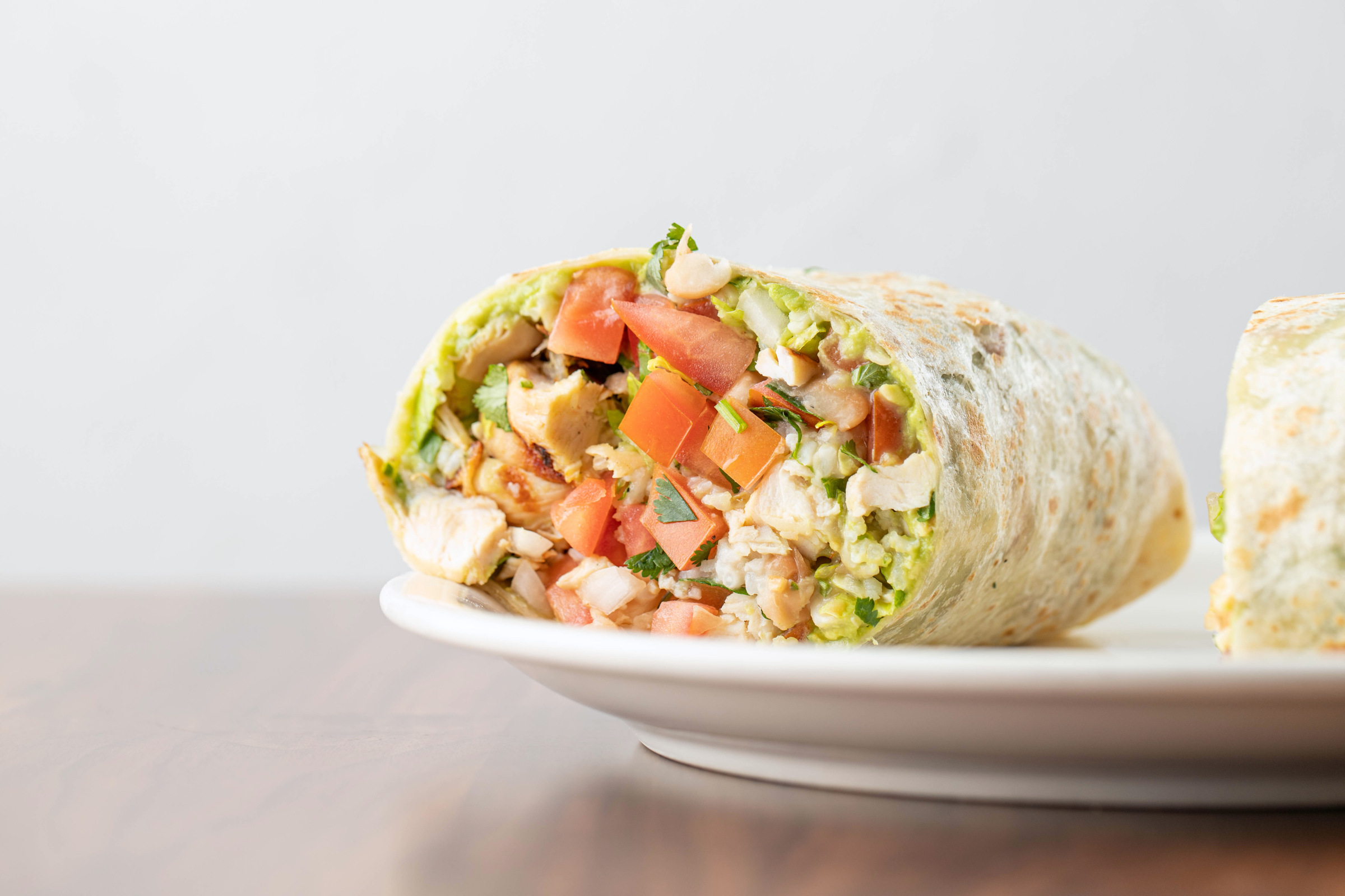 Baja burrito cut open to show its filling